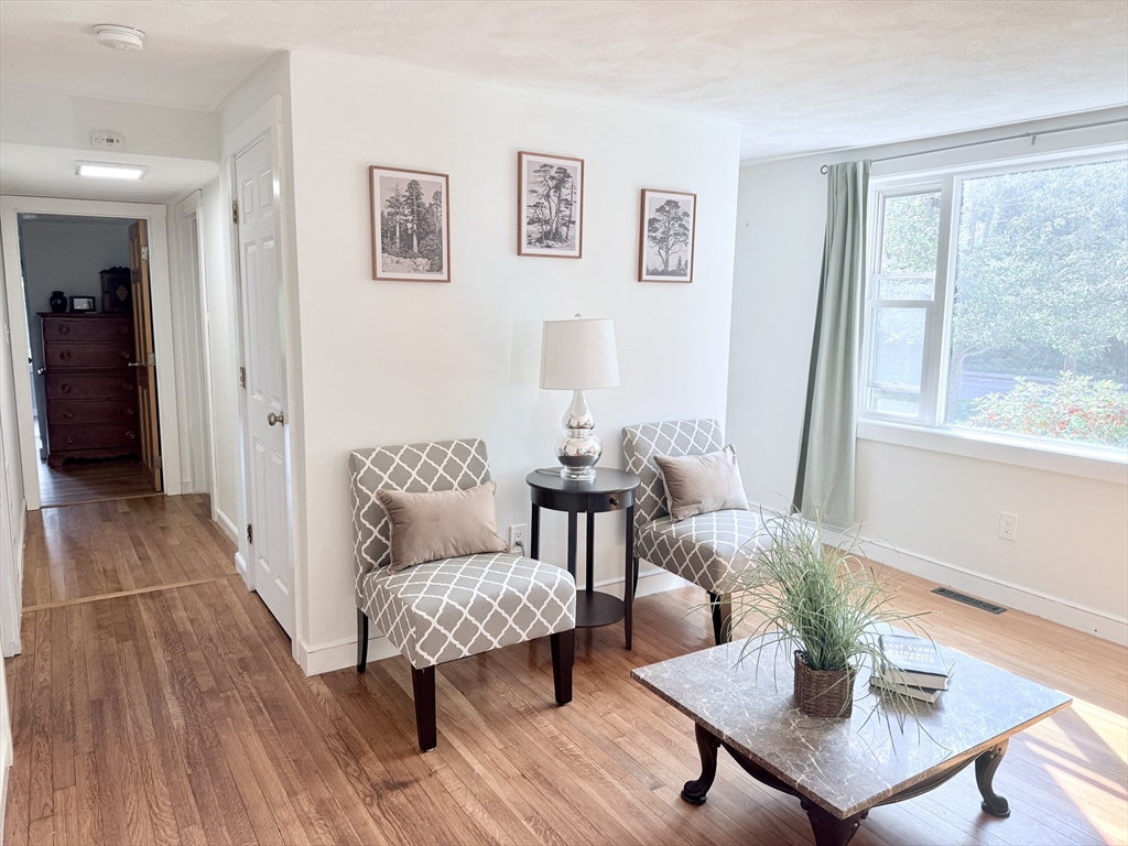975 South Main Street Bellingham, MA 02019 - Photo 10 of 38 a living room with furniture and a window