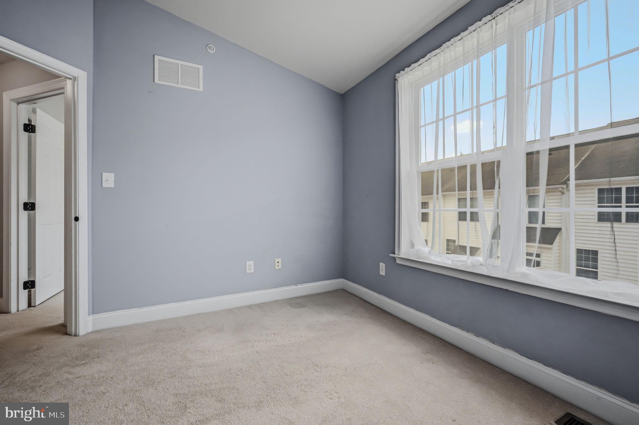 208 Jackdaw Alley, Unit 208 Springfield, PA 19064 - Photo 37 of 49 an empty room with a window