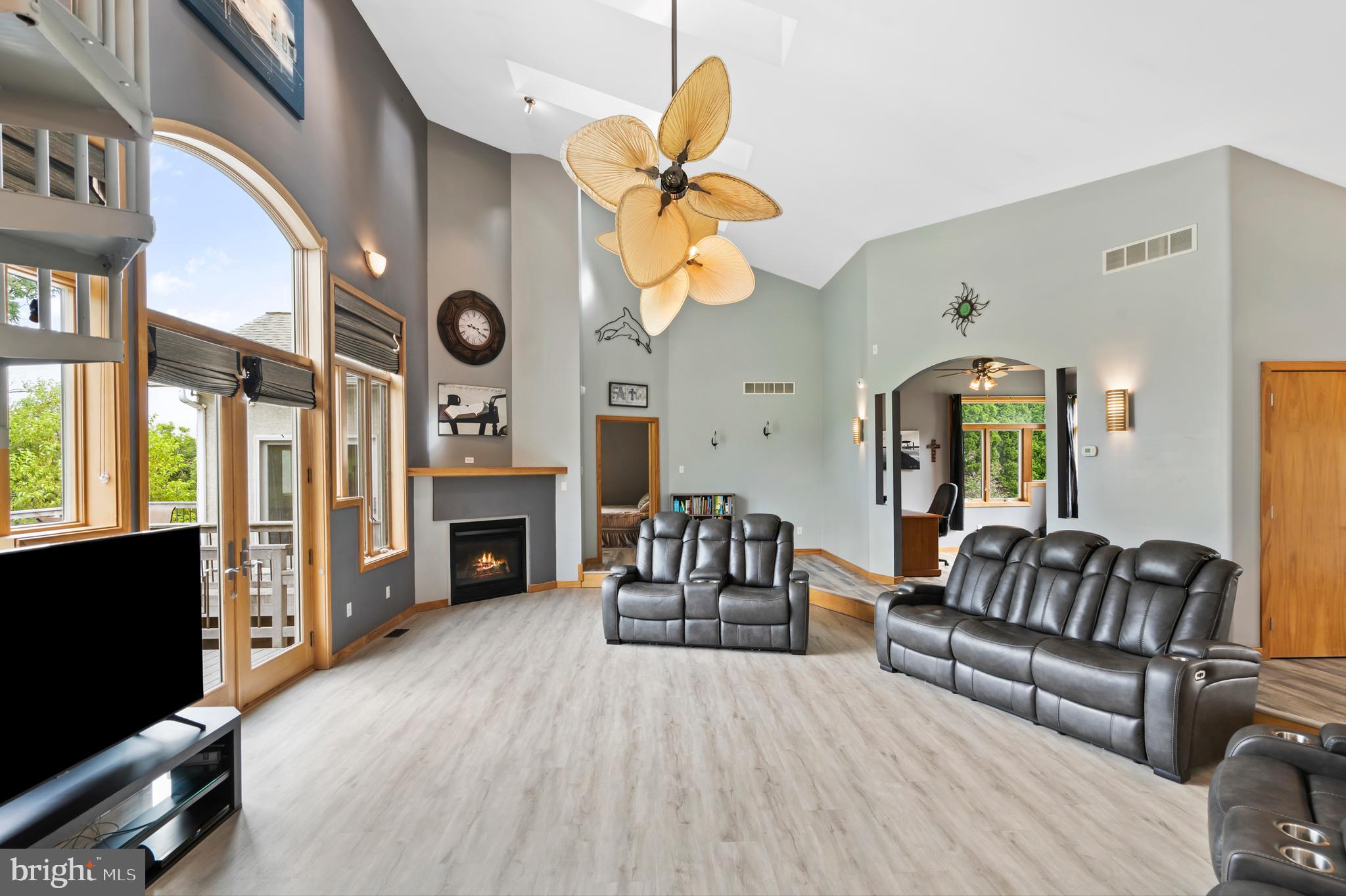 213 Cross Road Gilbertsville, PA 19525 - Photo 12 of 75 a living room with furniture a fireplace and a large window