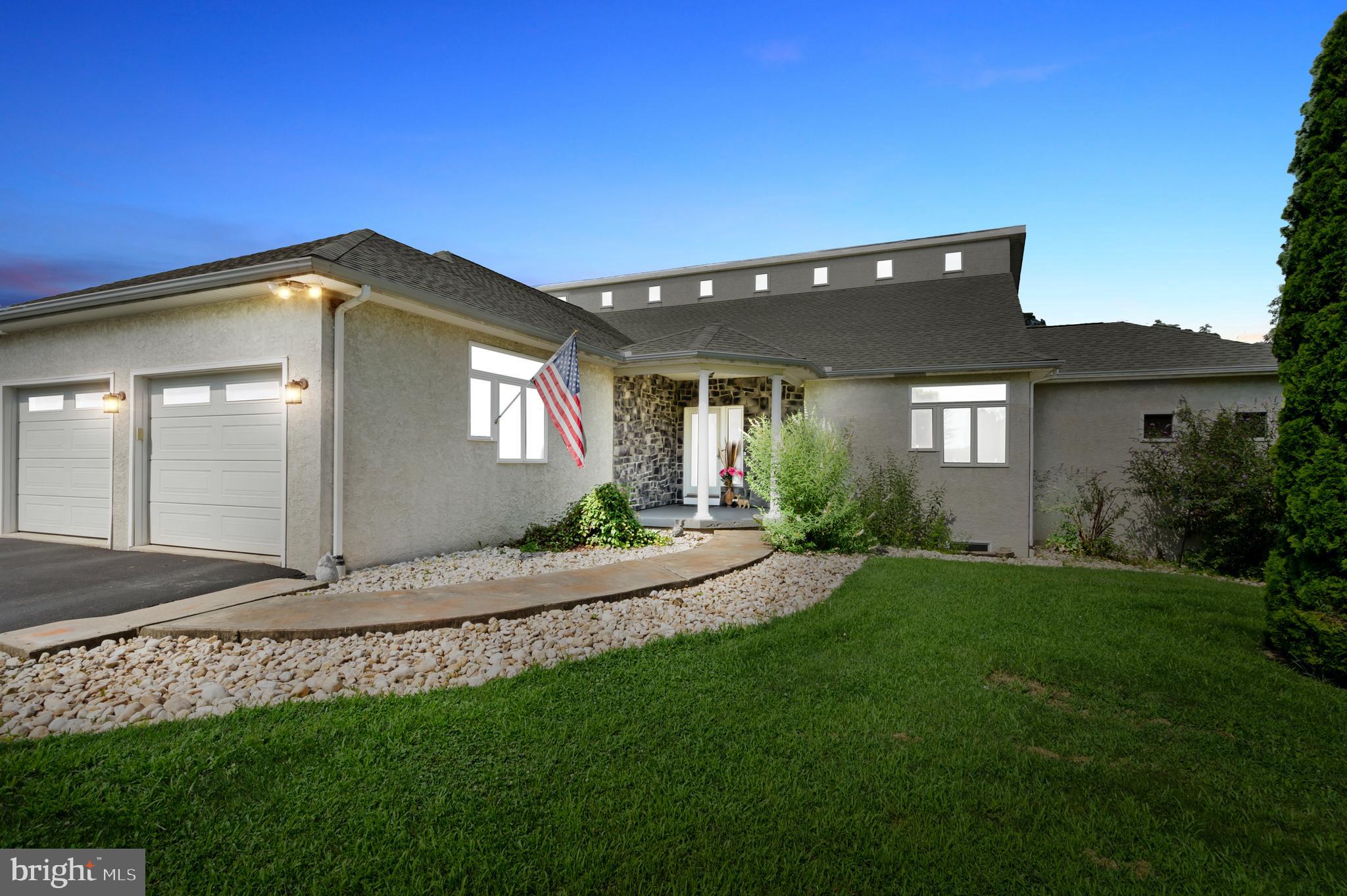 213 Cross Road Gilbertsville, PA 19525 - Photo 2 of 75 a front view of a house with a yard