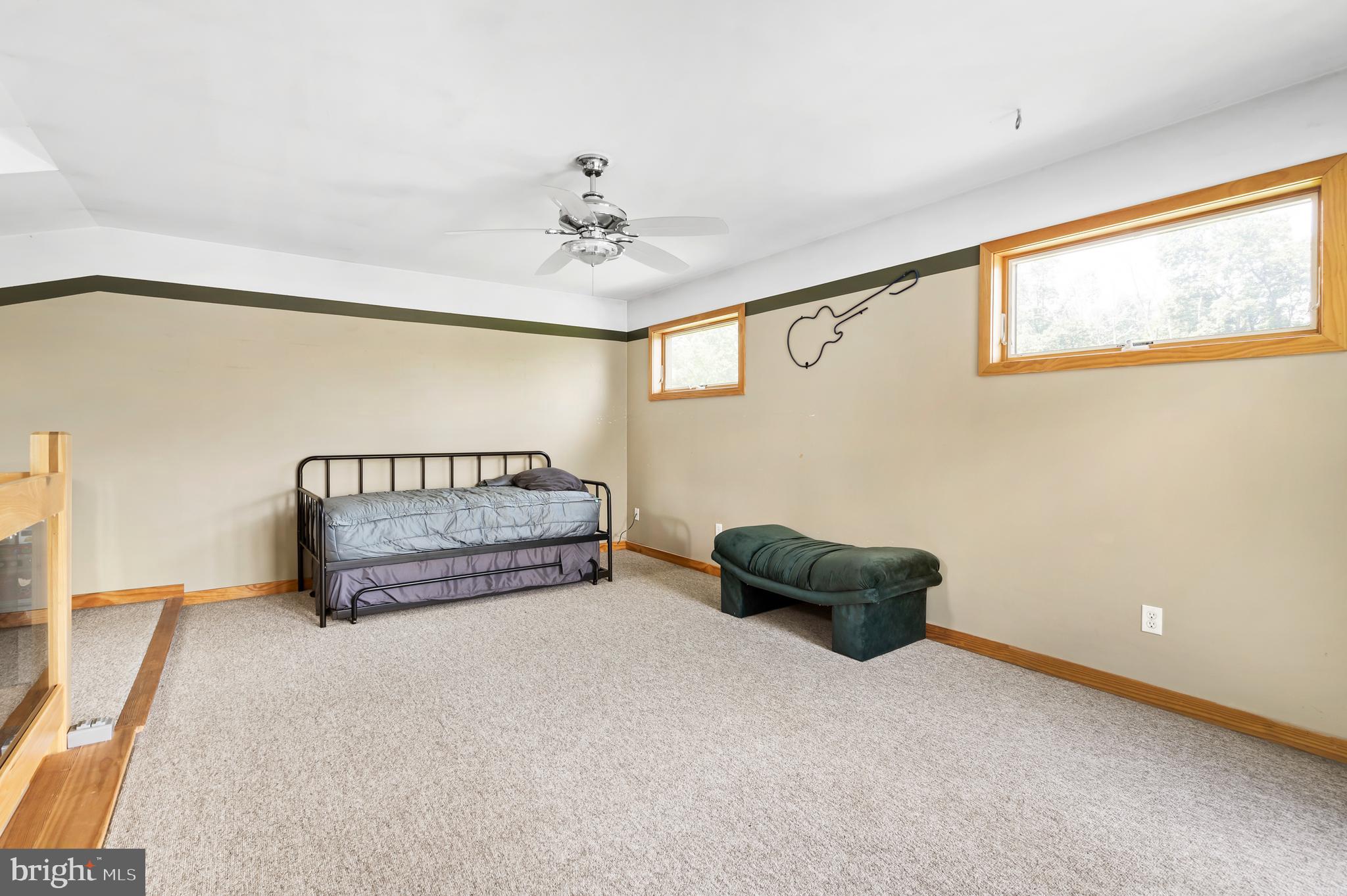 213 Cross Road Gilbertsville, PA 19525 - Photo 32 of 75 a bedroom with a bed and a window