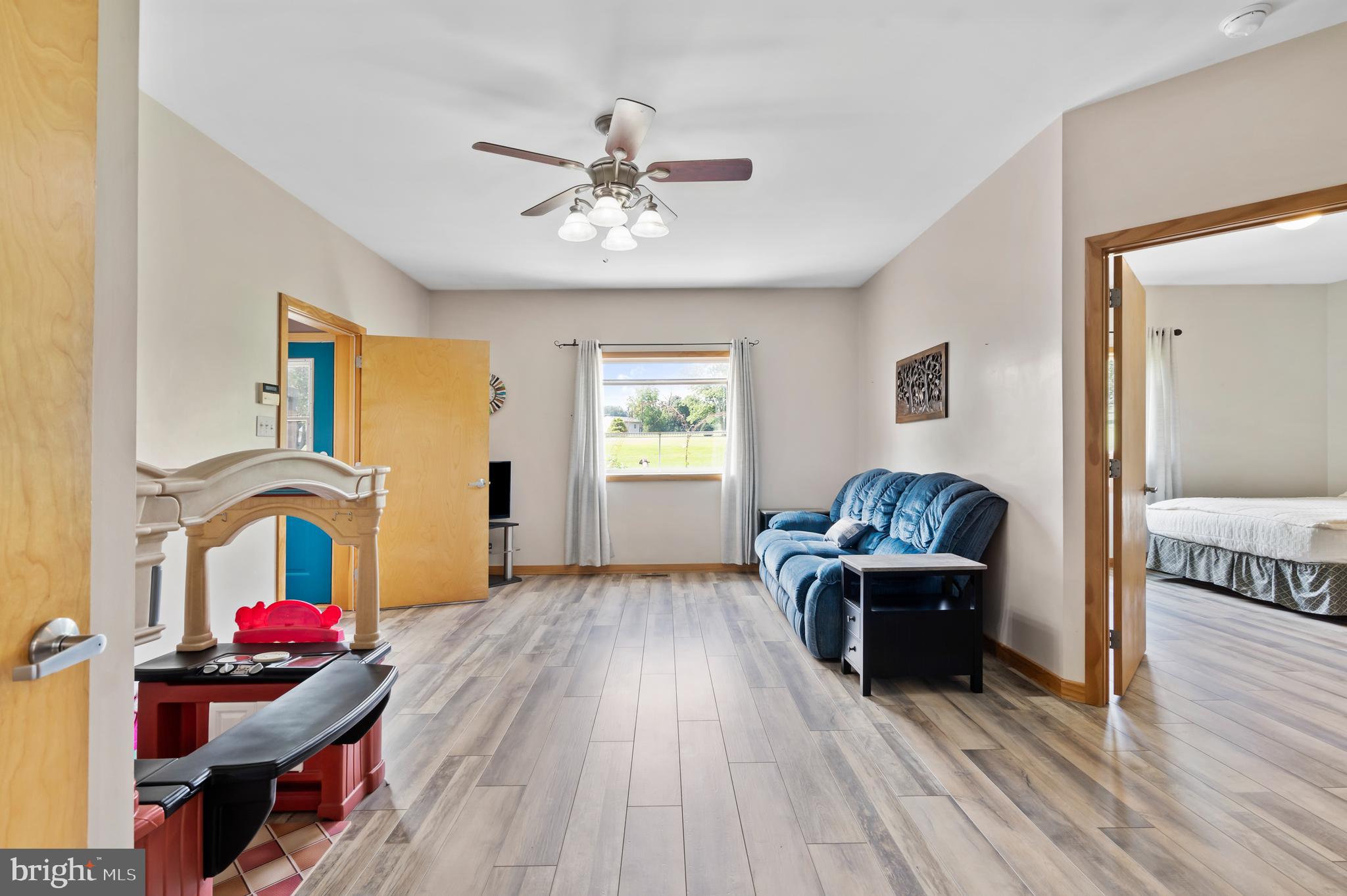 213 Cross Road Gilbertsville, PA 19525 - Photo 35 of 75 a living room with furniture and a wooden floor