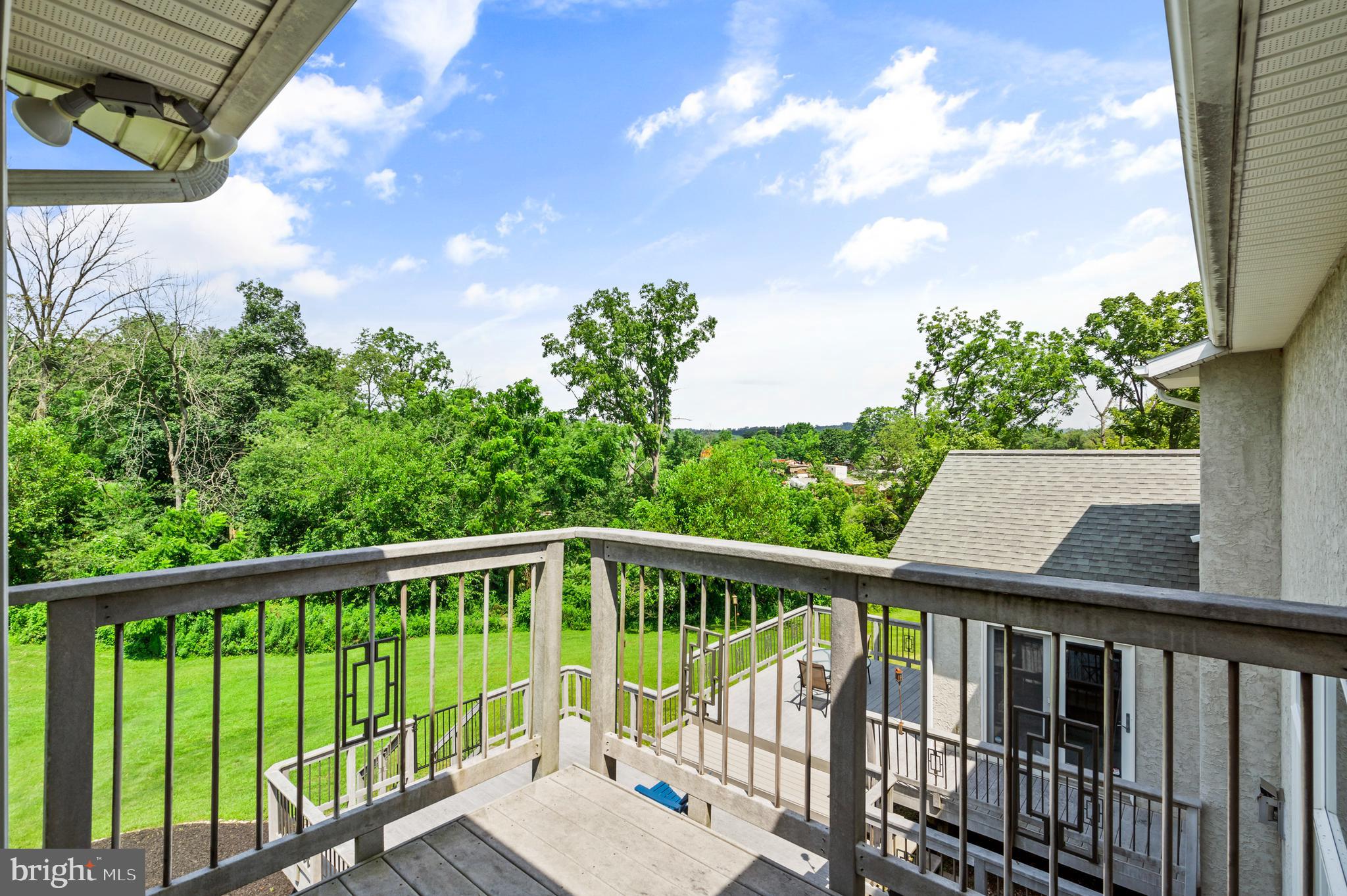 213 Cross Road Gilbertsville, PA 19525 - Photo 37 of 75 a view of a balcony with wooden floor and fence