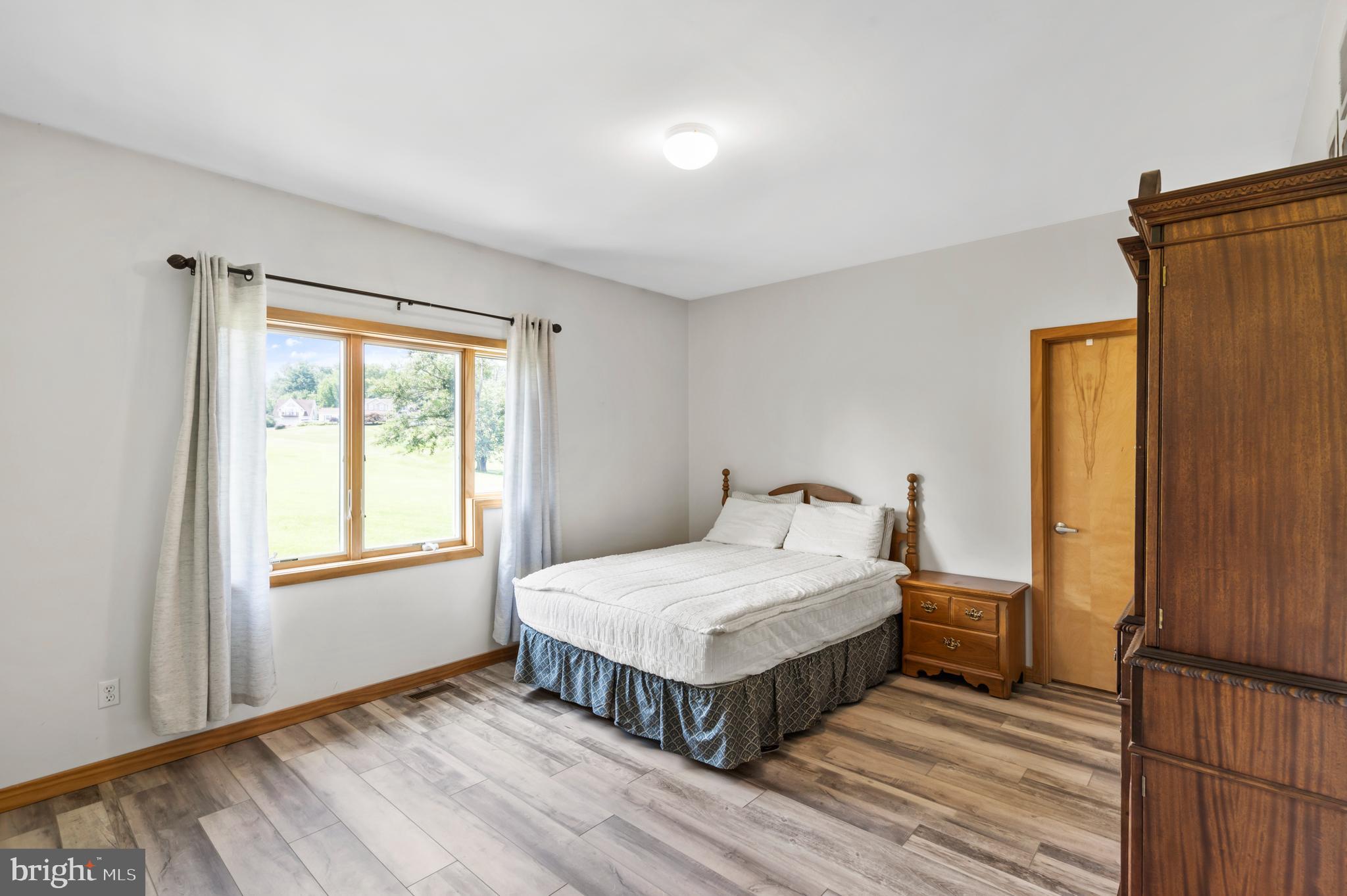 213 Cross Road Gilbertsville, PA 19525 - Photo 37 of 75 a bedroom with a bed and a window