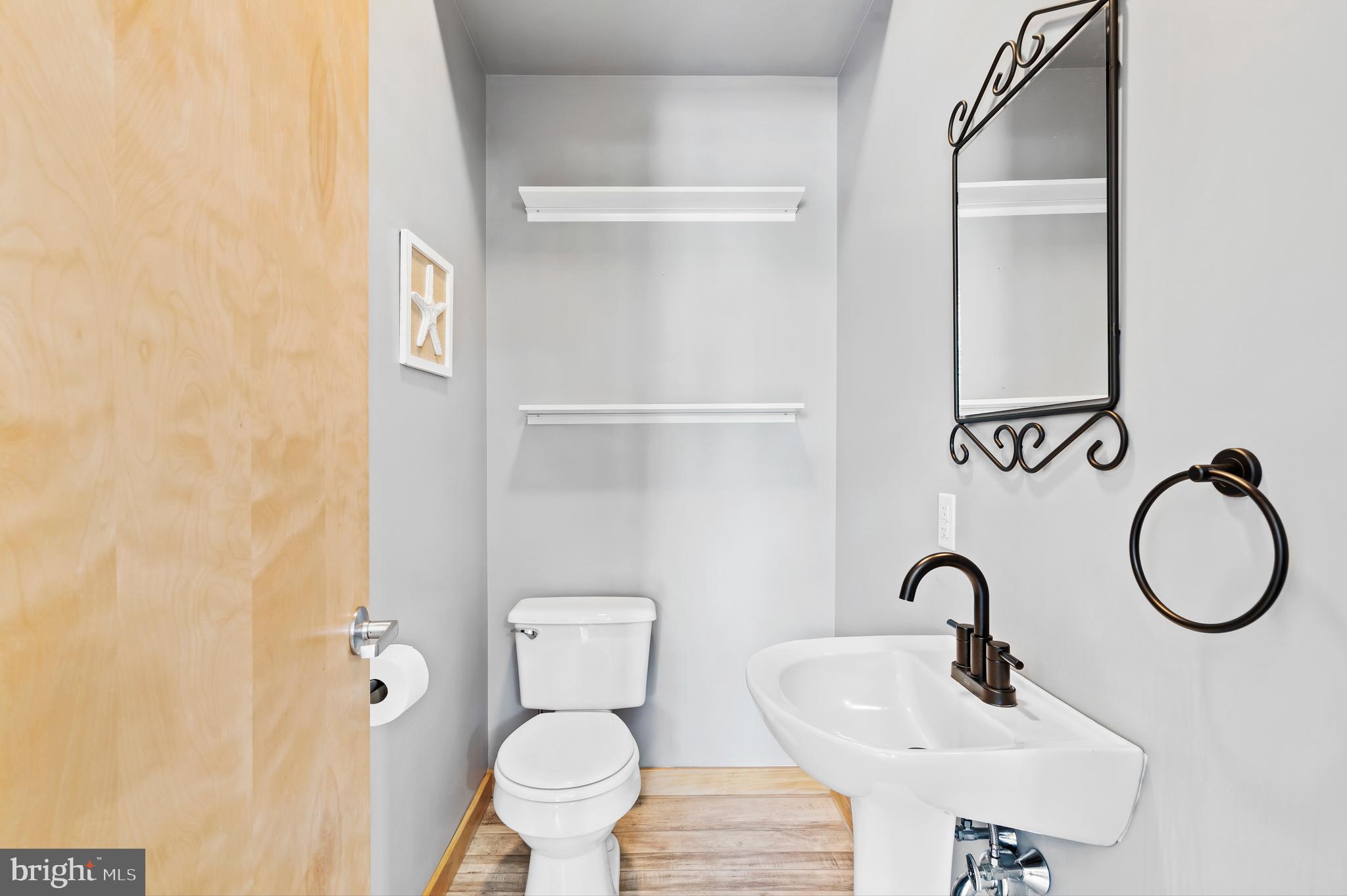 213 Cross Road Gilbertsville, PA 19525 - Photo 41 of 75 a bathroom with a sink and a mirror