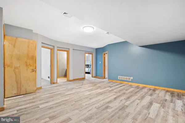 an aerial view of a house with backyard