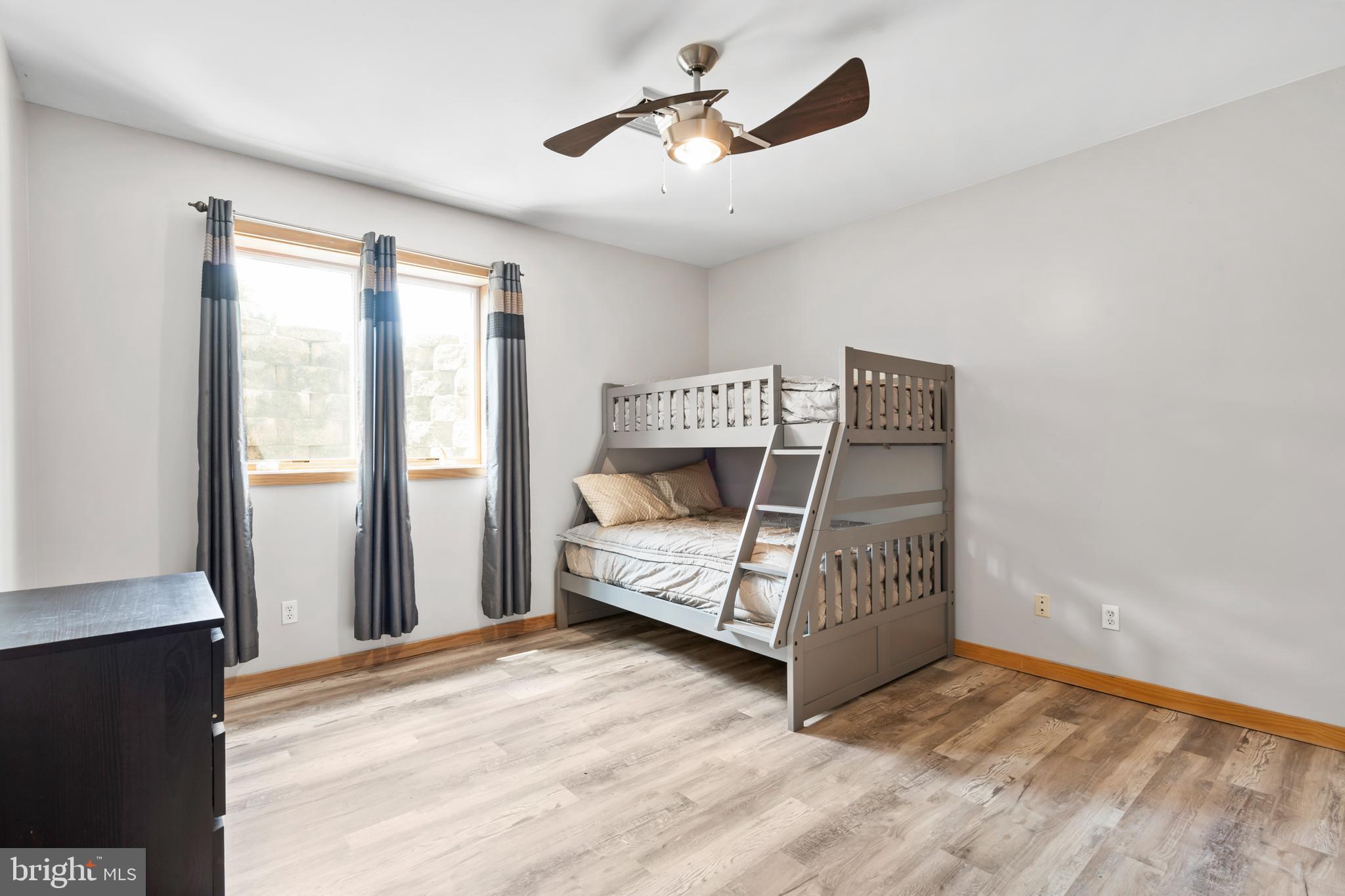 213 Cross Road Gilbertsville, PA 19525 - Photo 45 of 75 a bedroom with a bed and a window