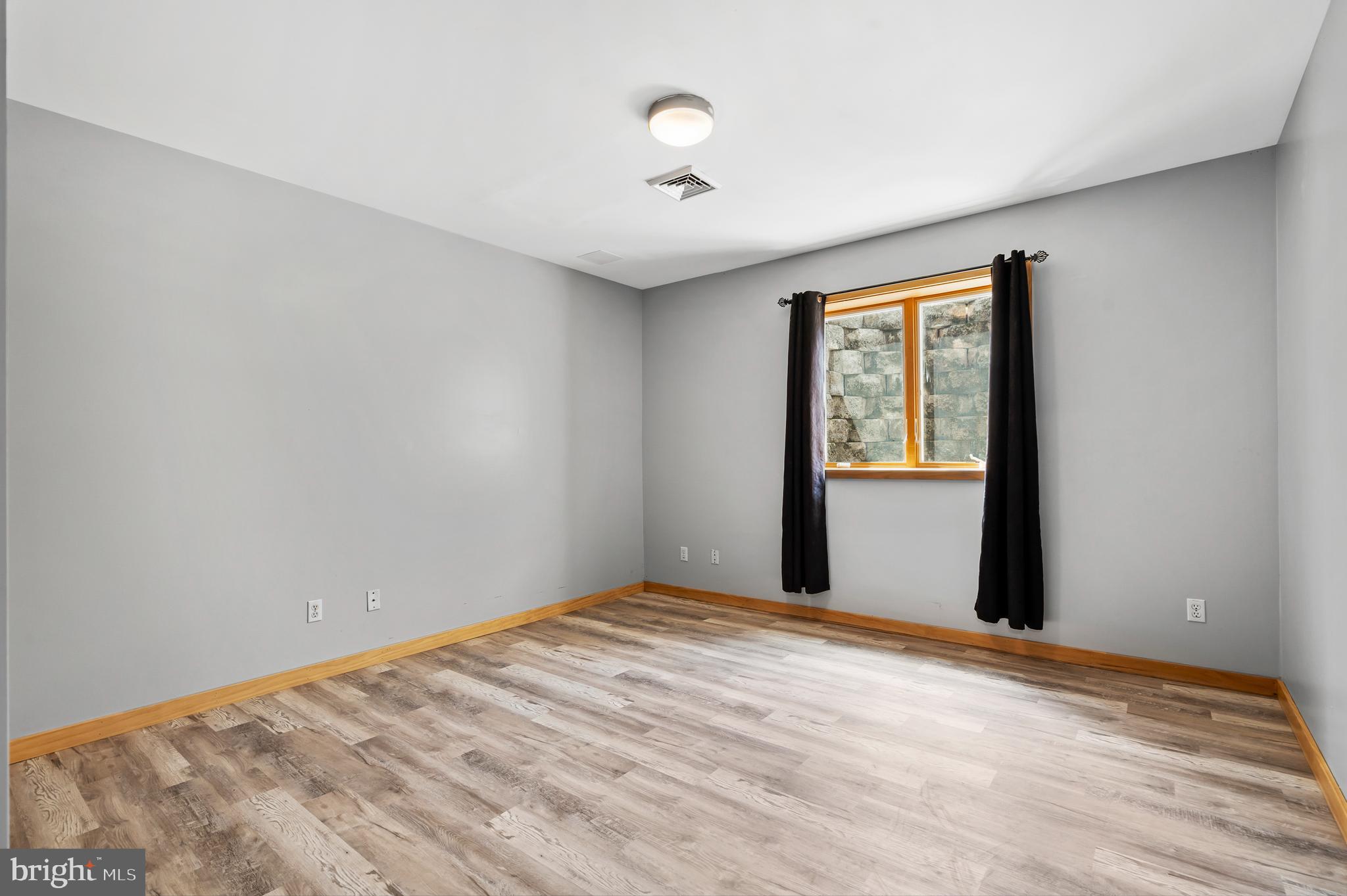 213 Cross Road Gilbertsville, PA 19525 - Photo 50 of 75 a view of an empty room and window