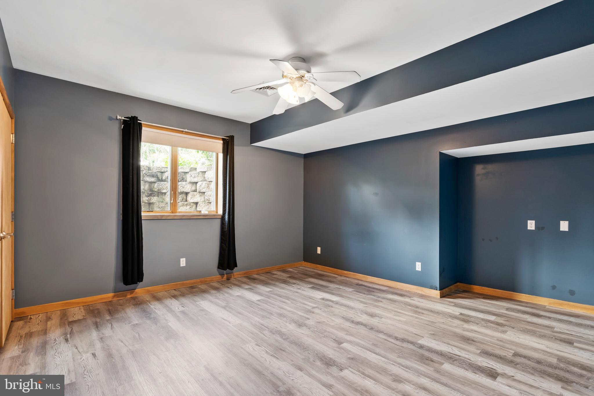213 Cross Road Gilbertsville, PA 19525 - Photo 55 of 75 a view of a room with a ceiling fan and window