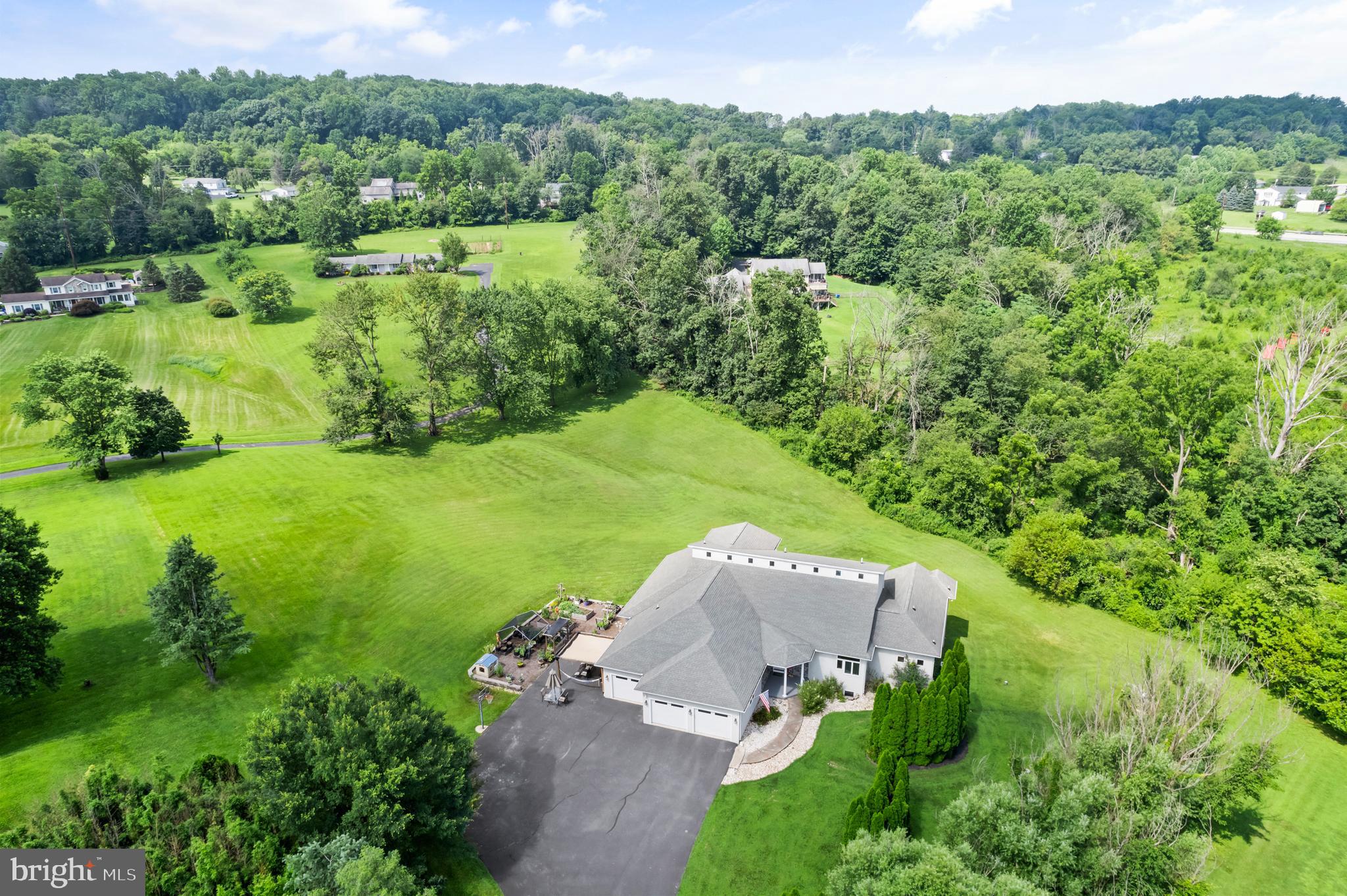 213 Cross Road Gilbertsville, PA 19525 - Photo 69 of 75 a view of a garden with an outdoor space
