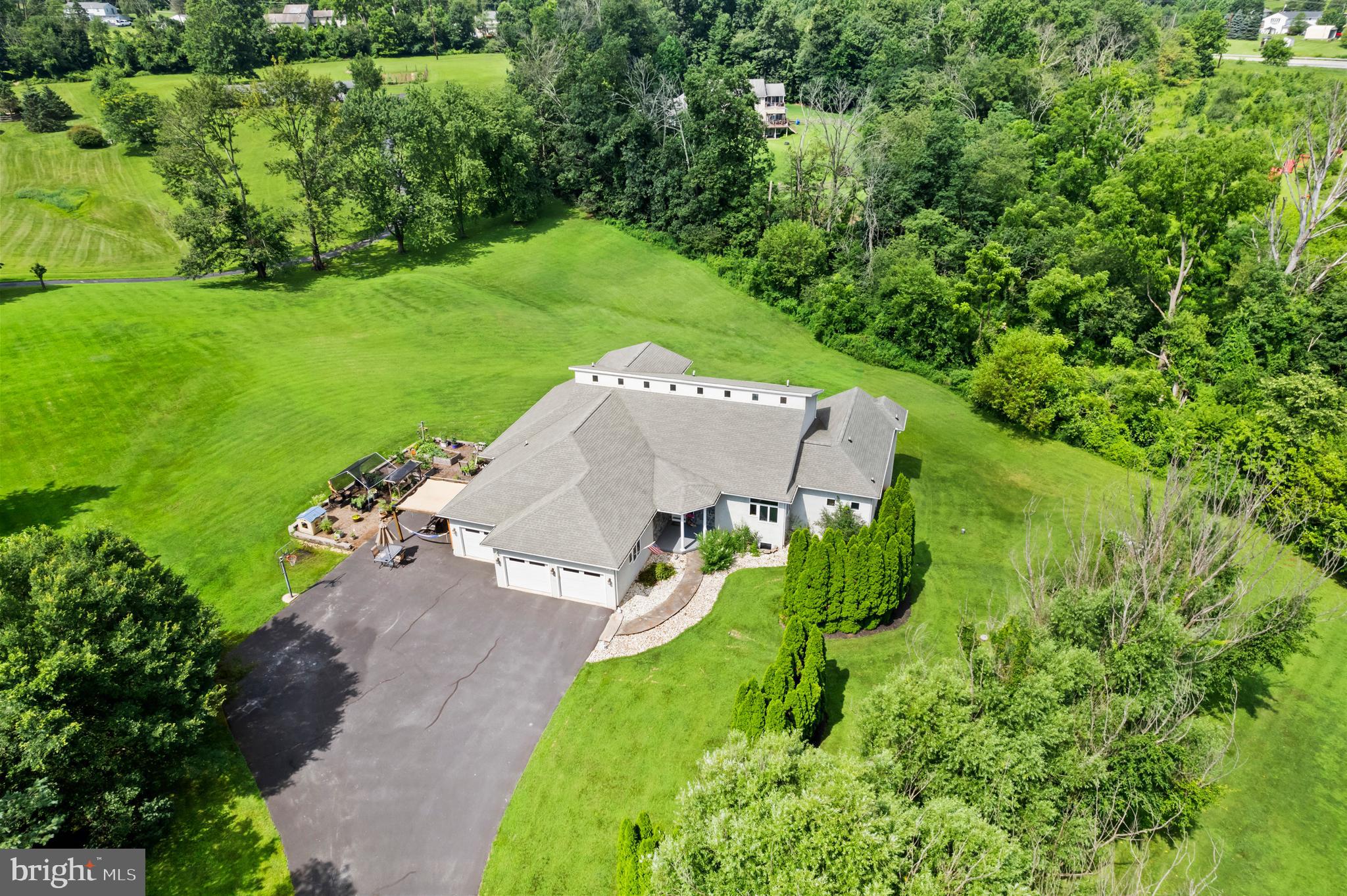213 Cross Road Gilbertsville, PA 19525 - Photo 70 of 75 an aerial view of residential houses with outdoor space and trees all around