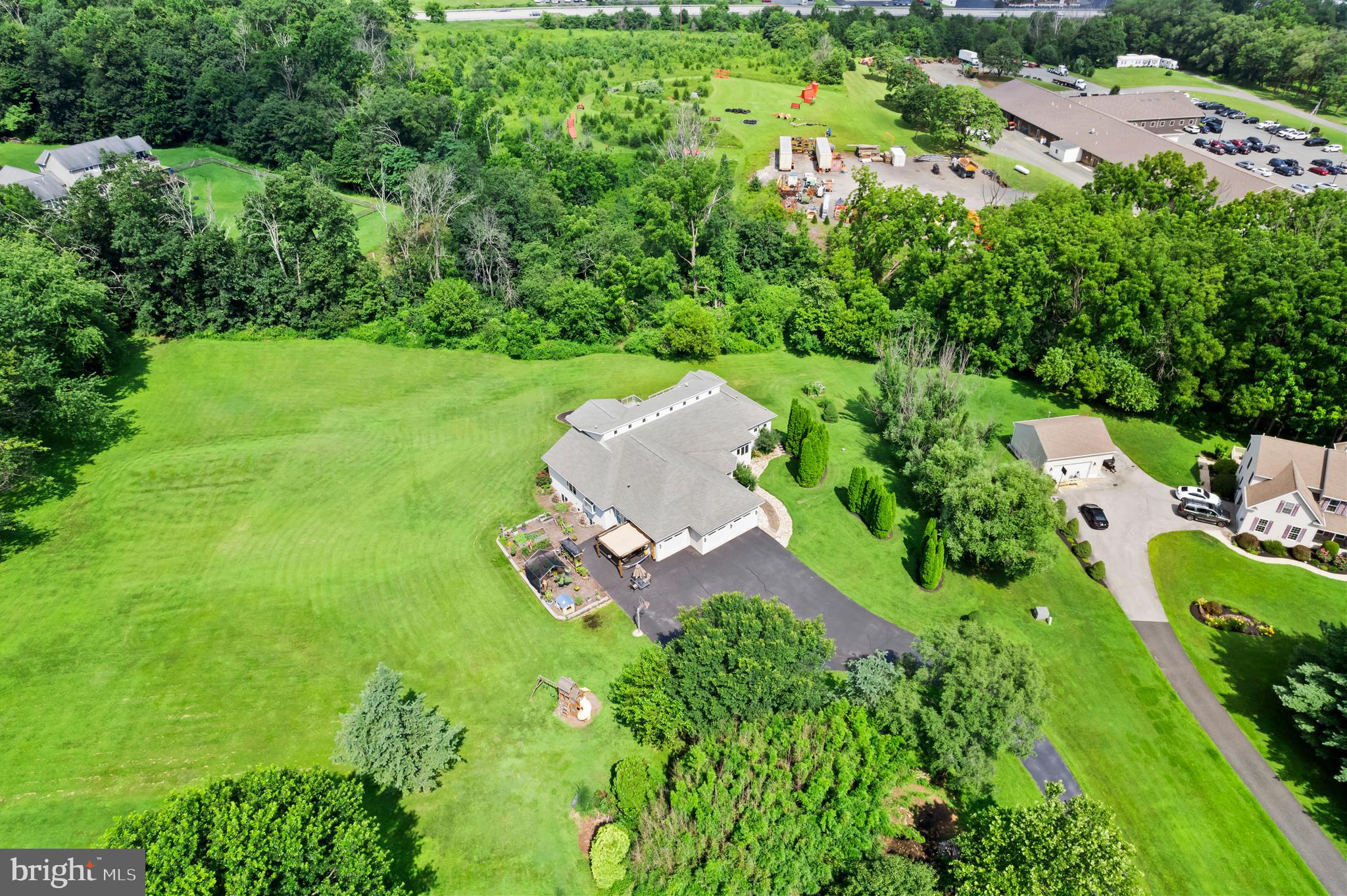 213 Cross Road Gilbertsville, PA 19525 - Photo 74 of 75 an aerial view of residential house with outdoor space and trees all around