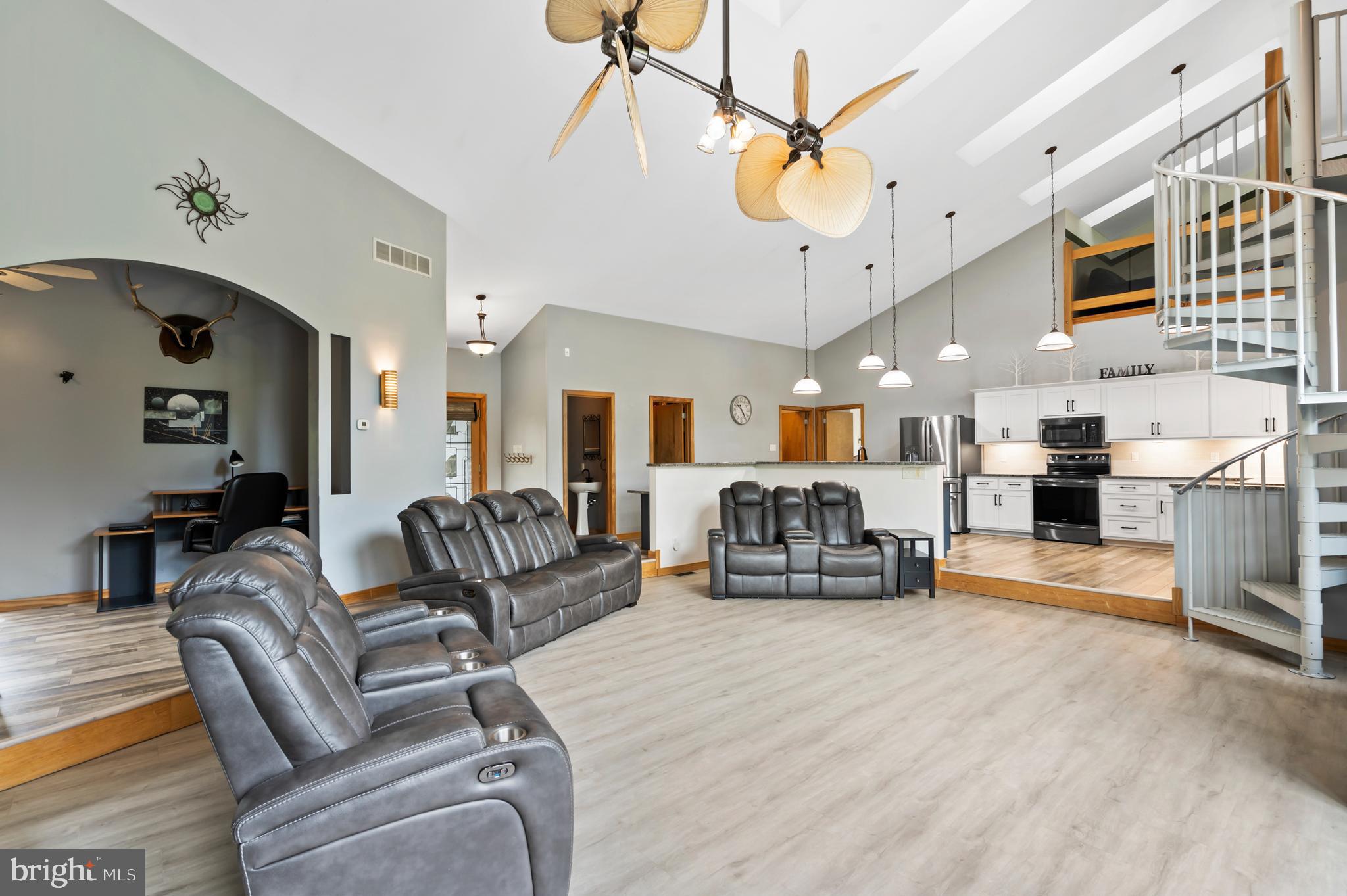 213 Cross Road Gilbertsville, PA 19525 - Photo 9 of 75 a living room with furniture kitchen view and a chandelier