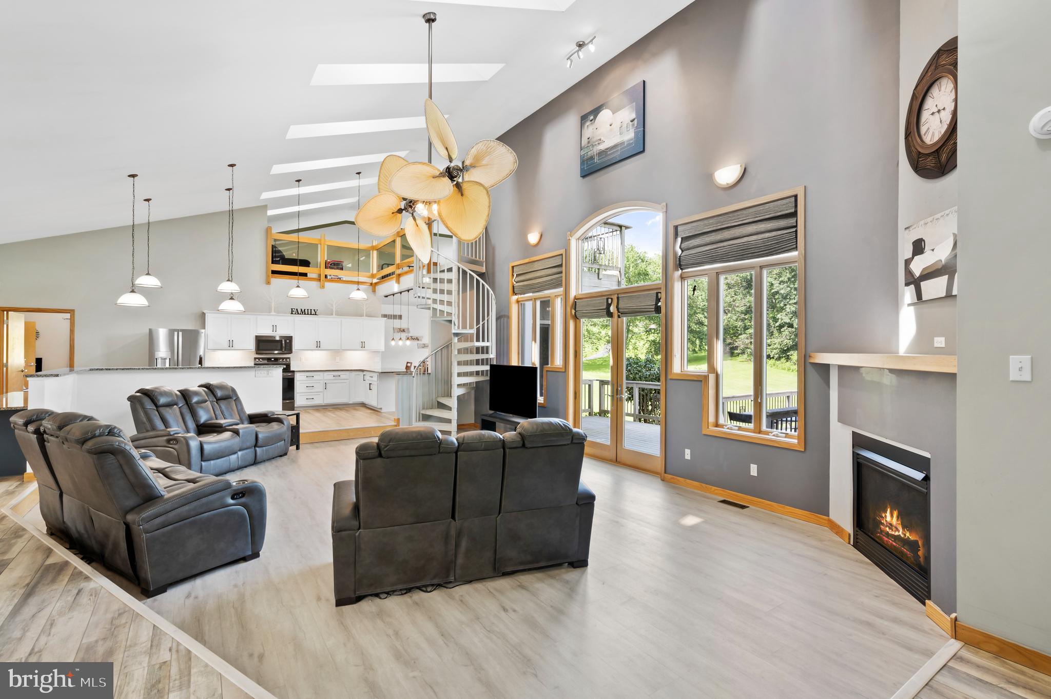 213 Cross Road Gilbertsville, PA 19525 - Photo 10 of 75 a living room with fireplace furniture and a large window