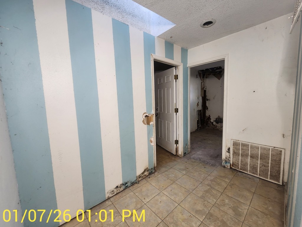 230 Kansas Street Bacliff, TX 77518 - Photo 13 of 16 a view of a hallway with closet area
