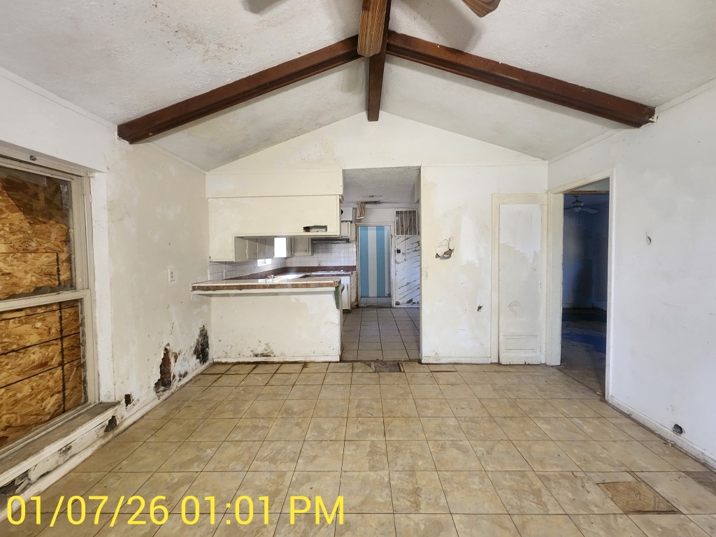 230 Kansas Street Bacliff, TX 77518 - Photo 4 of 16 a view of kitchen with refrigerator and microwave
