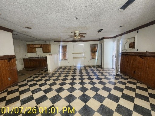 230 Kansas Street Bacliff, TX 77518 - Photo 5 of 16 a living room with a black white checkered floor with couches chair and fireplace