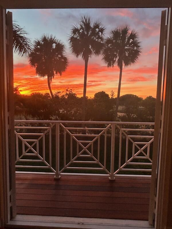 5844 Pinebrook Drive Boca Raton, FL 33433 - Photo 80 of 104 Warm skies doors open deck