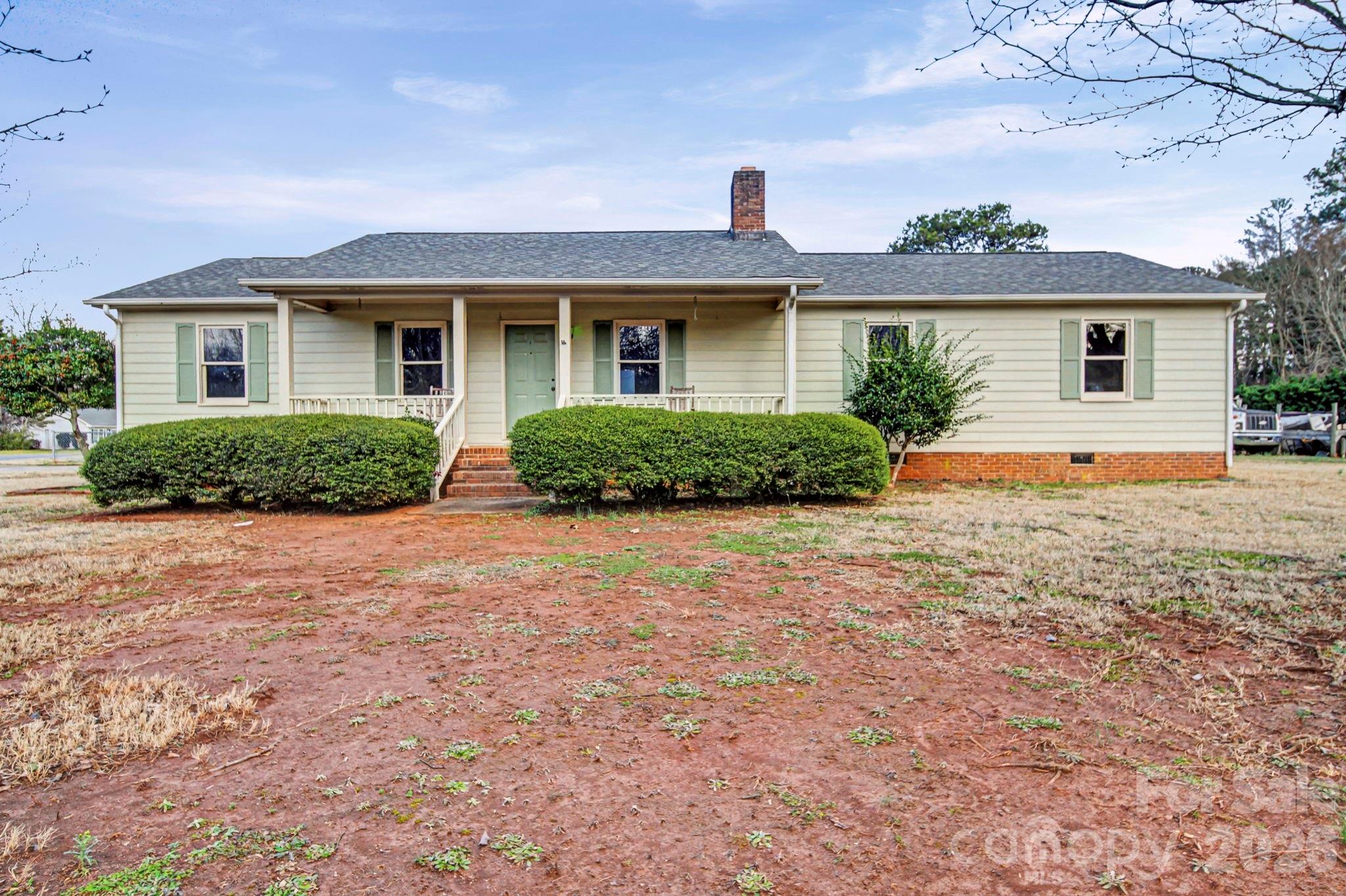 102 Roxie Lane Belmont, NC 28012 - Photo 1 of 26 front view of a house with a yard