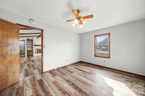 a view of an empty room and window