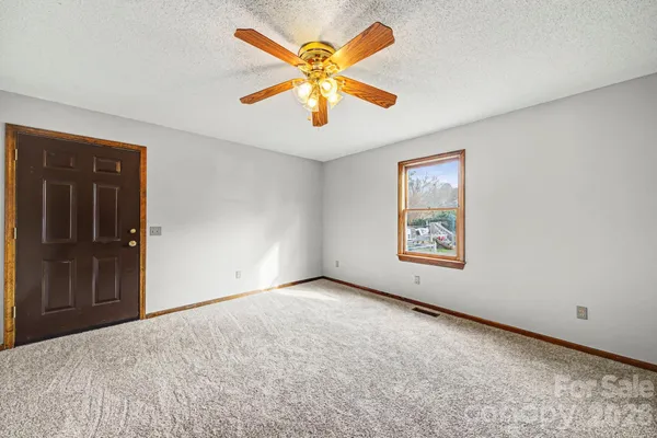 a view of an empty room with window