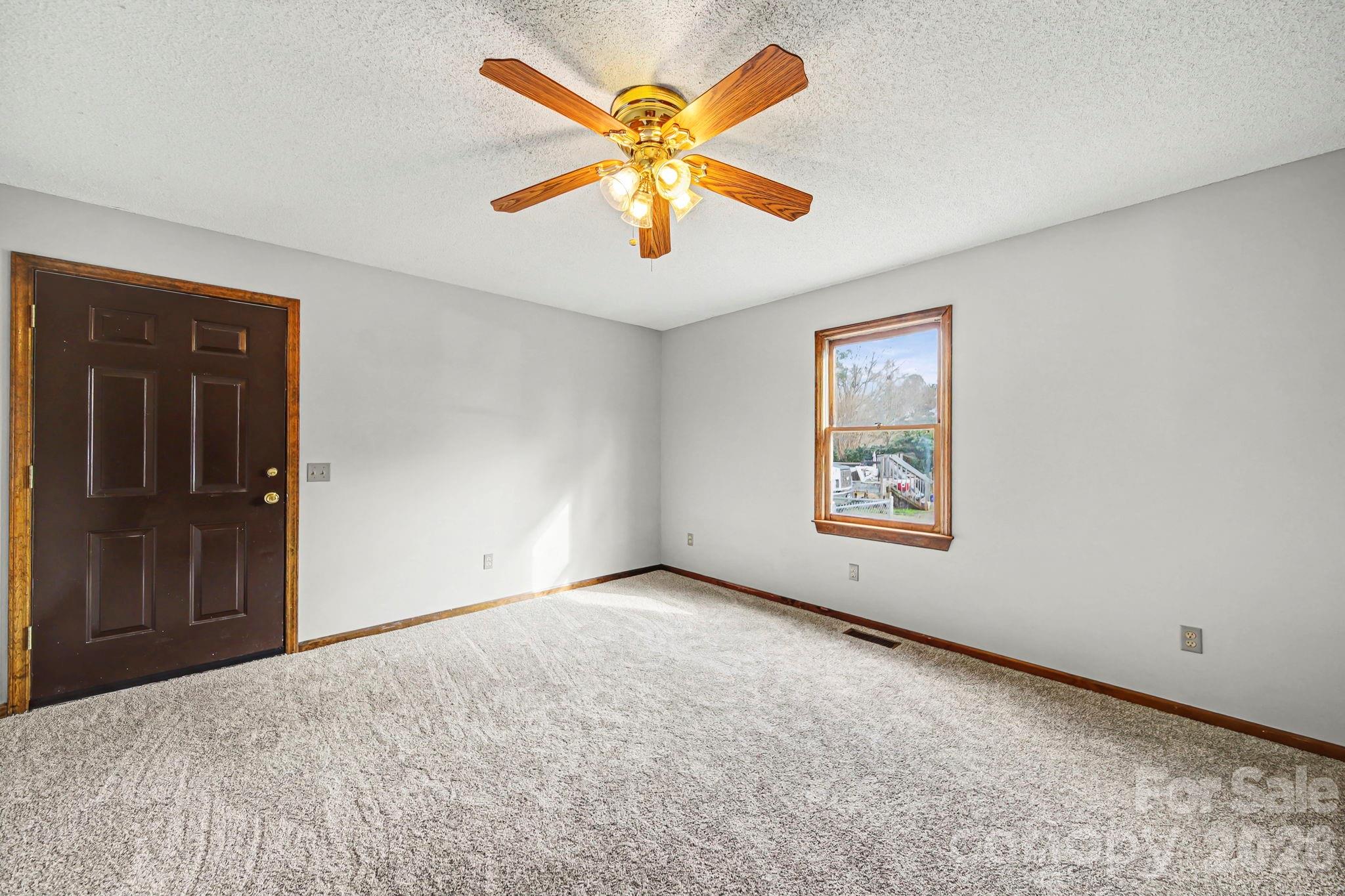 102 Roxie Lane Belmont, NC 28012 - Photo 21 of 26 a view of an empty room with window
