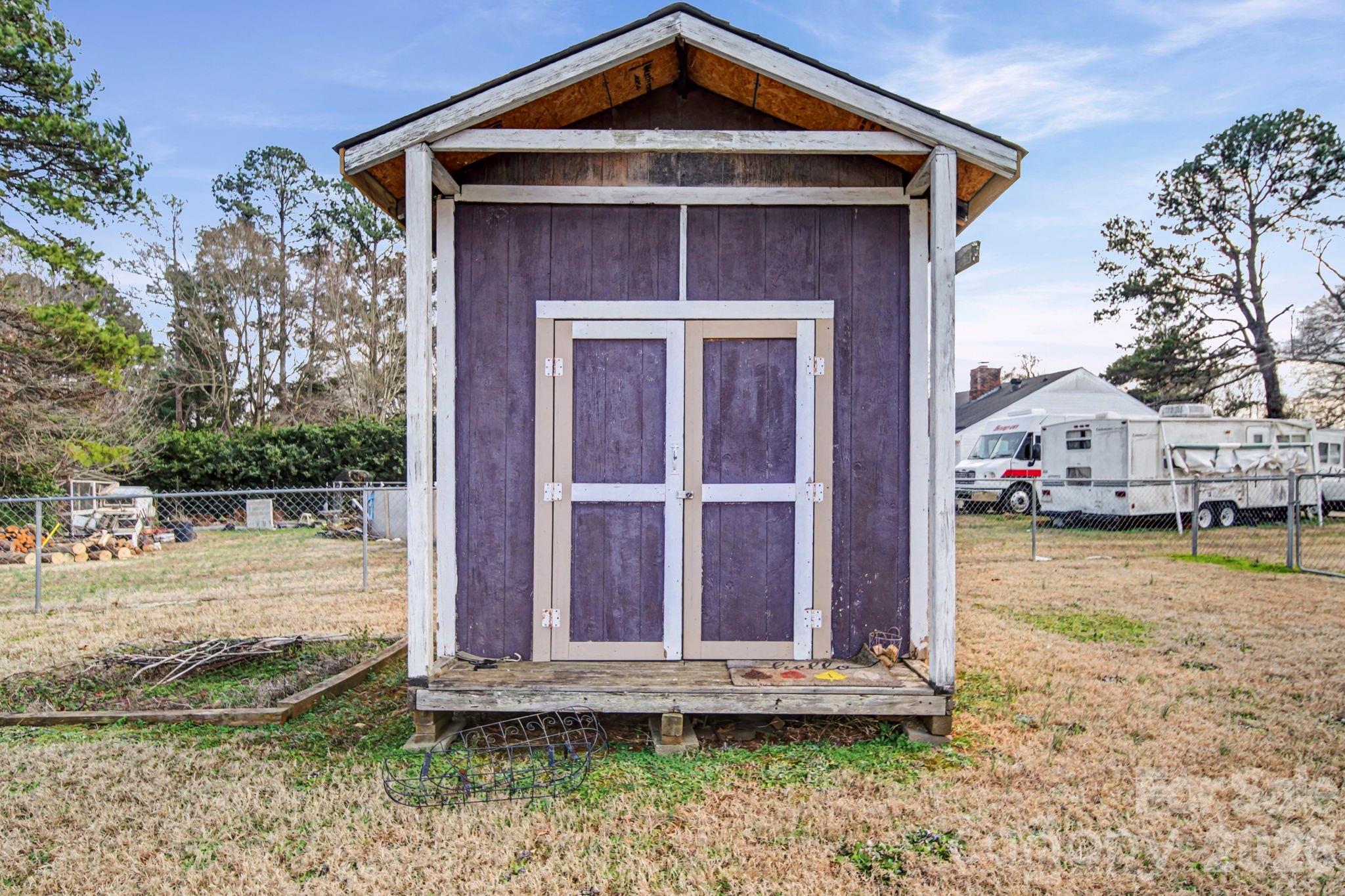 102 Roxie Lane Belmont, NC 28012 - Photo 26 of 26 a front view of a house with garden