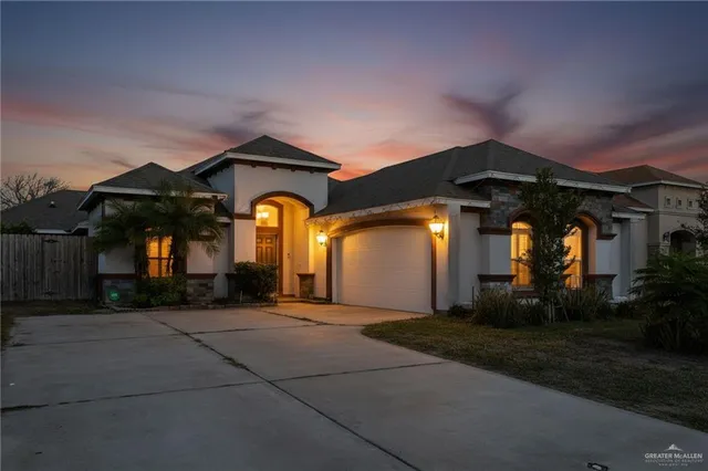 a house view with a garden space