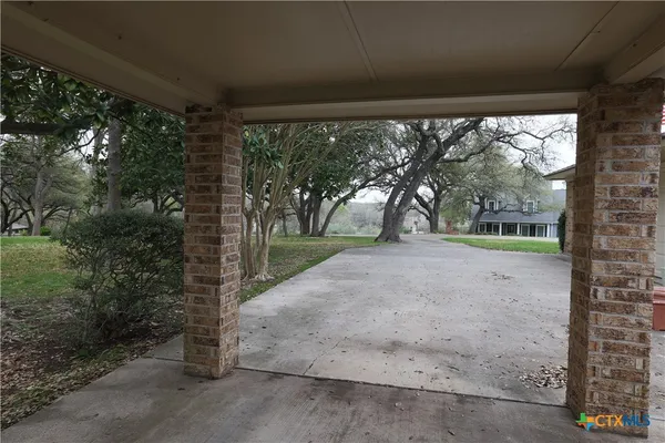 a view of a road with a porch