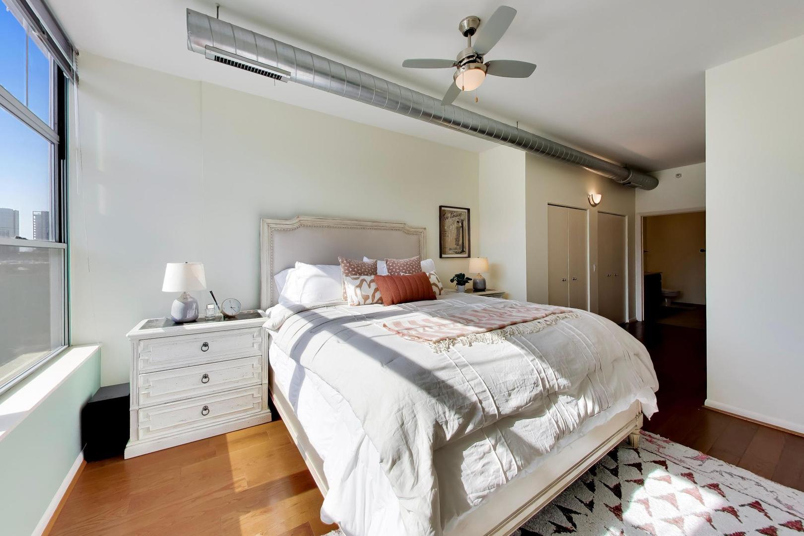 1200 West Monroe Street, Unit 502 Chicago, IL 60607 - Photo 13 of 34 a large white bed in a white room