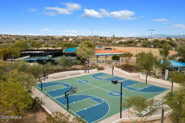 a view of a lake with couches and city view