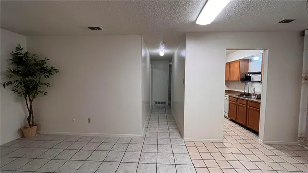 a view of a kitchen with a sink