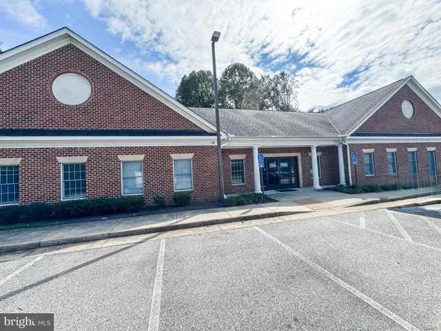 a front view of a house with a garage