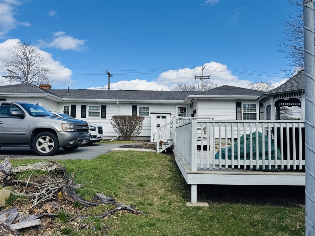 649 Stafford Road Fall River, MA 02721 - Photo 17 of 17 a view of a house with a patio