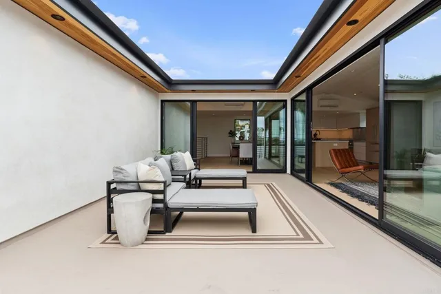 a front view of a house with a garage