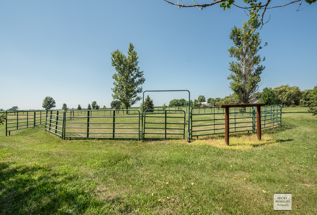 5545 Nettle Creek Road Morris, IL 60450 - Photo 13 of 45 a view of a bench under a yard