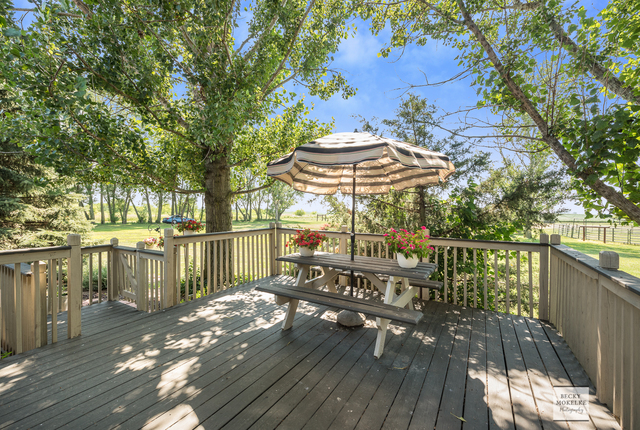 5545 Nettle Creek Road Morris, IL 60450 - Photo 27 of 45 a view of a balcony with wooden floor