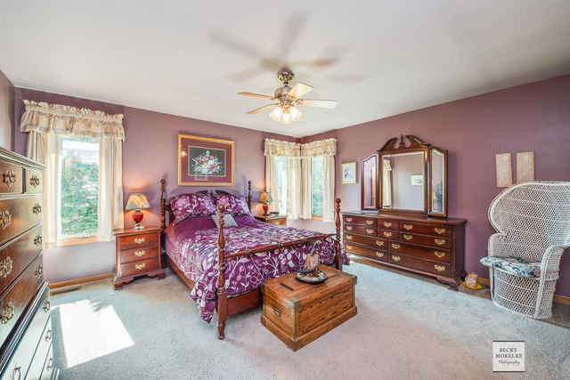 5545 Nettle Creek Road Morris, IL 60450 - Photo 28 of 45 a bed room with furniture and a window