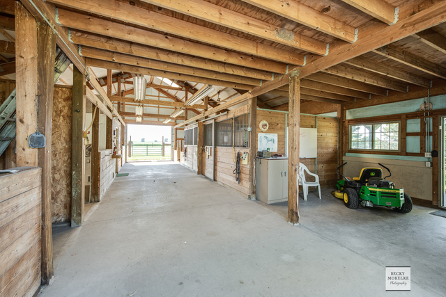 5545 Nettle Creek Road Morris, IL 60450 - Photo 9 of 45 a view of an empty room with wooden floor