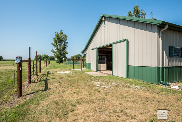 5545 Nettle Creek Road Morris, IL 60450 - Photo 10 of 45 a view of a house with backyard and a tree
