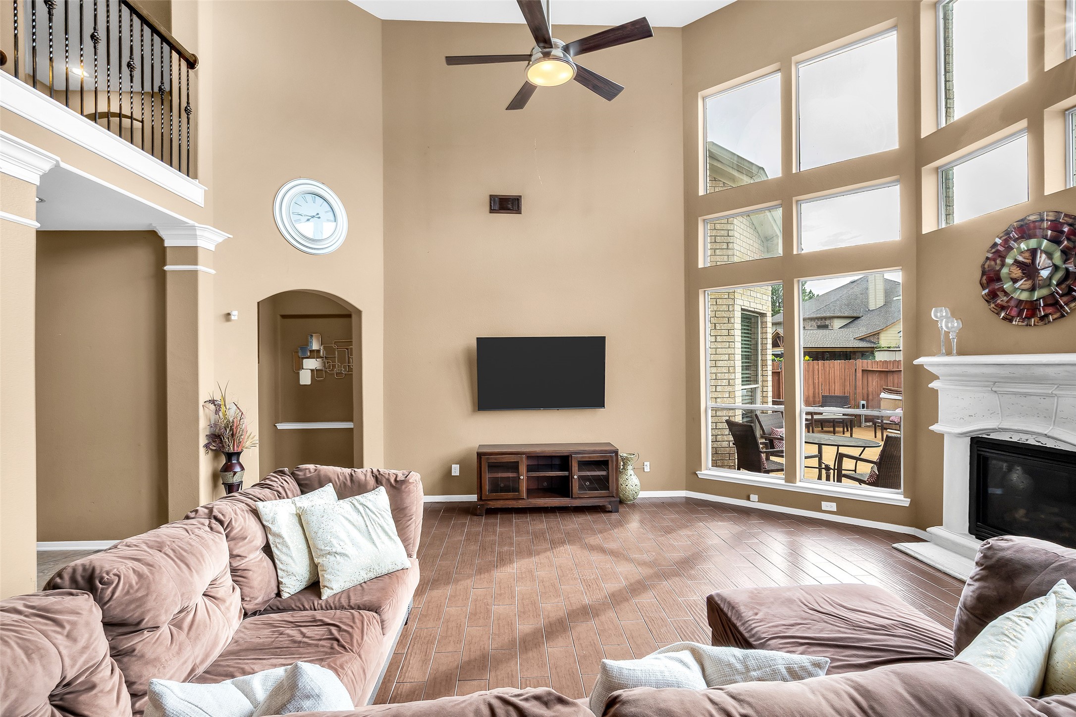 611 River Delta Lane Rosenberg, TX 77469 - Photo 4 of 39 a living room with furniture a fireplace and a flat screen tv