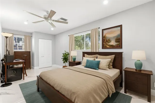 a small garden with palm trees