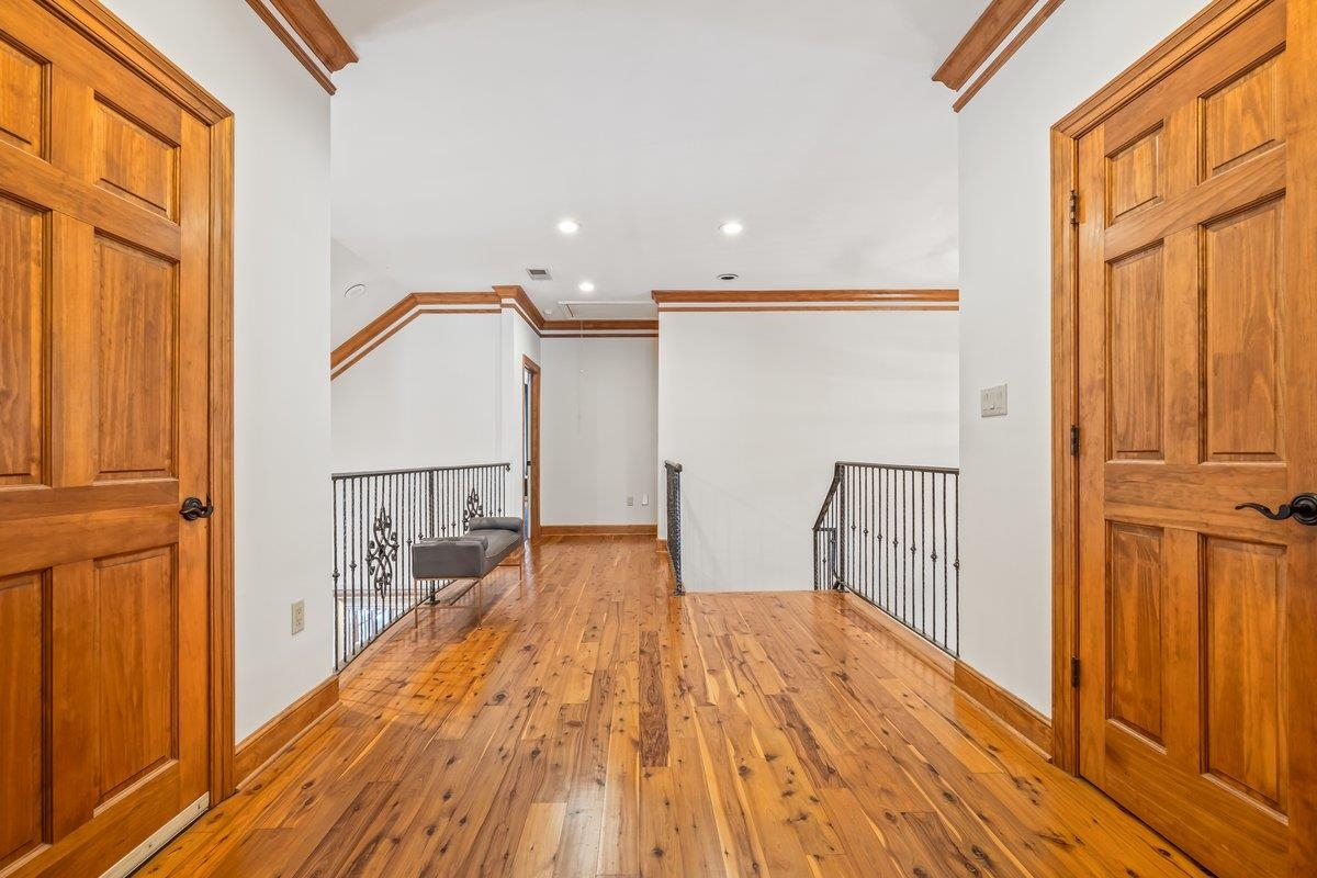 10951 Raleigh Lagrange Road East Eads, TN 38028 - Photo 17 of 40 a view of a hallway with wooden floor and staircase