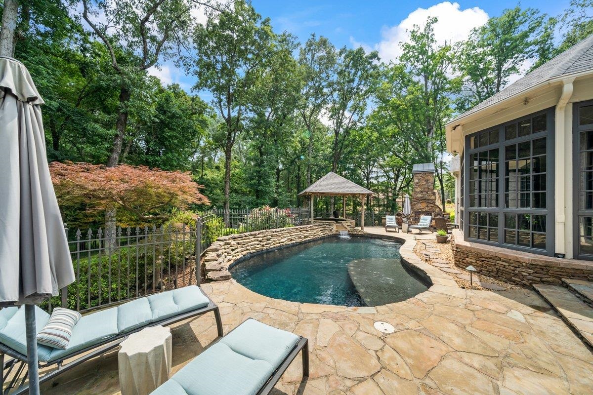 10951 Raleigh Lagrange Road East Eads, TN 38028 - Photo 21 of 40 a view of a swimming pool and dinning table and chairs
