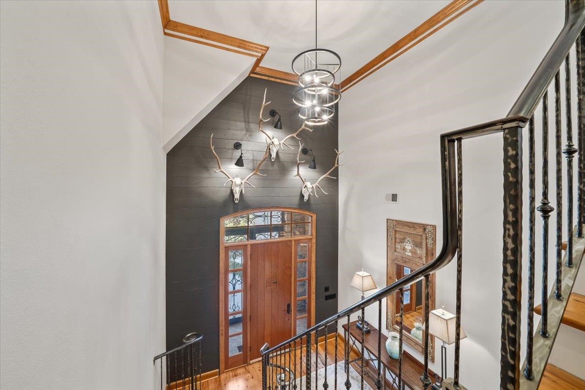 10951 Raleigh Lagrange Road East Eads, TN 38028 - Photo 4 of 40 a view of a hallway with wooden floor and staircase