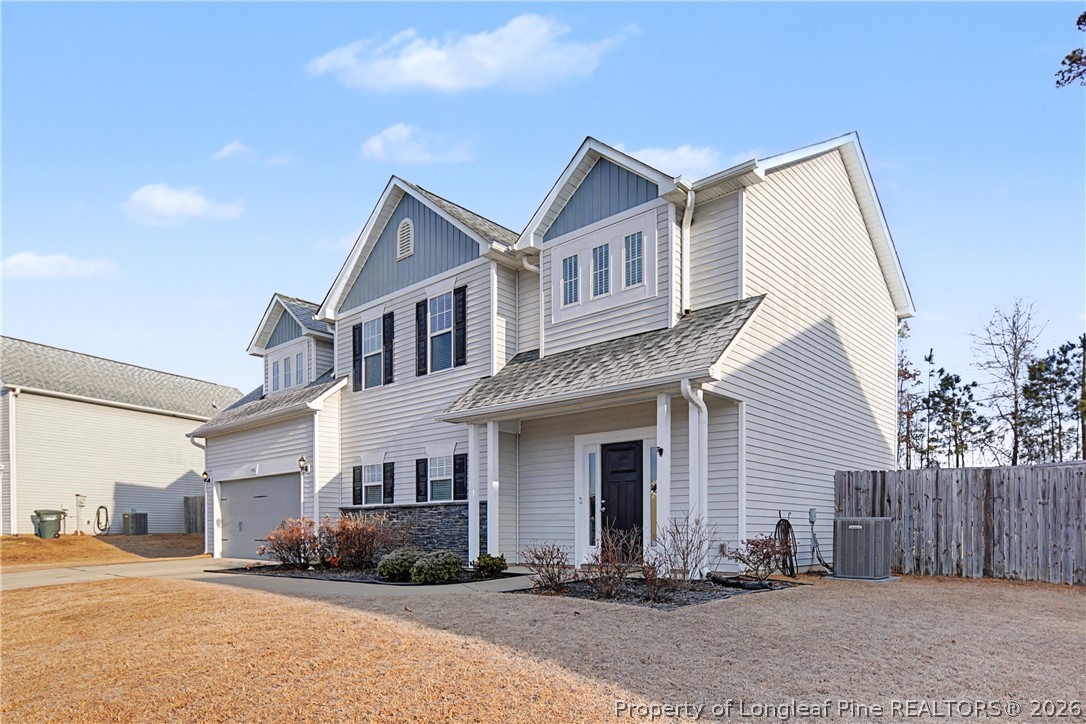 143 Ledgebrook Lane Raeford, NC 28376 - Photo 2 of 50 a front view of a house with a yard