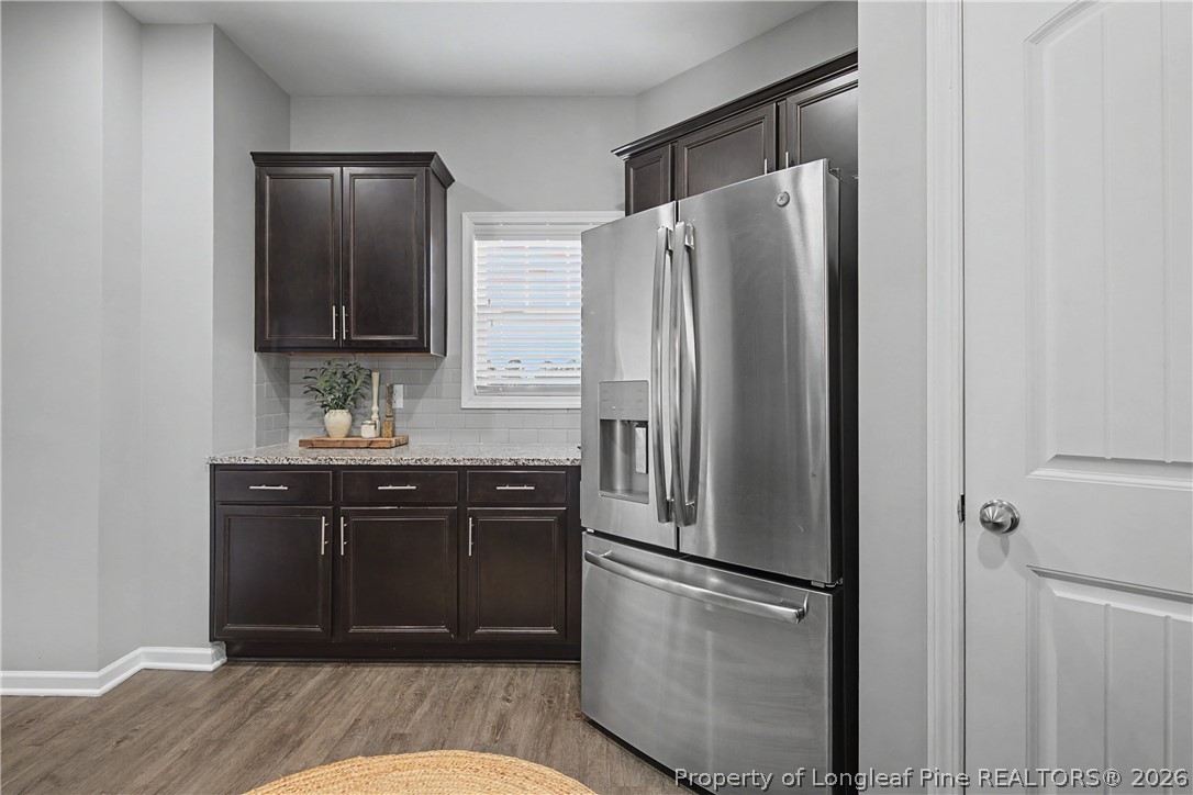 143 Ledgebrook Lane Raeford, NC 28376 - Photo 21 of 50 a kitchen with a refrigerator and a sink