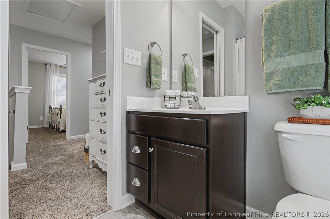 143 Ledgebrook Lane Raeford, NC 28376 - Photo 39 of 50 a bathroom with a sink toilet and shower