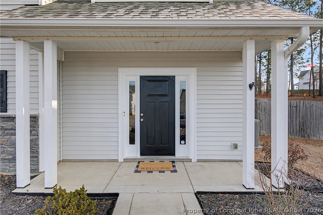 143 Ledgebrook Lane Raeford, NC 28376 - Photo 4 of 50 a view of a entryway door front of house