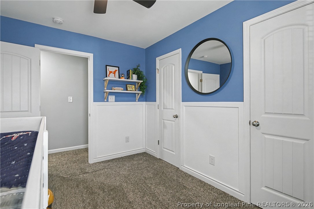 143 Ledgebrook Lane Raeford, NC 28376 - Photo 43 of 50 a view of a livingroom with wooden floor and cabinet